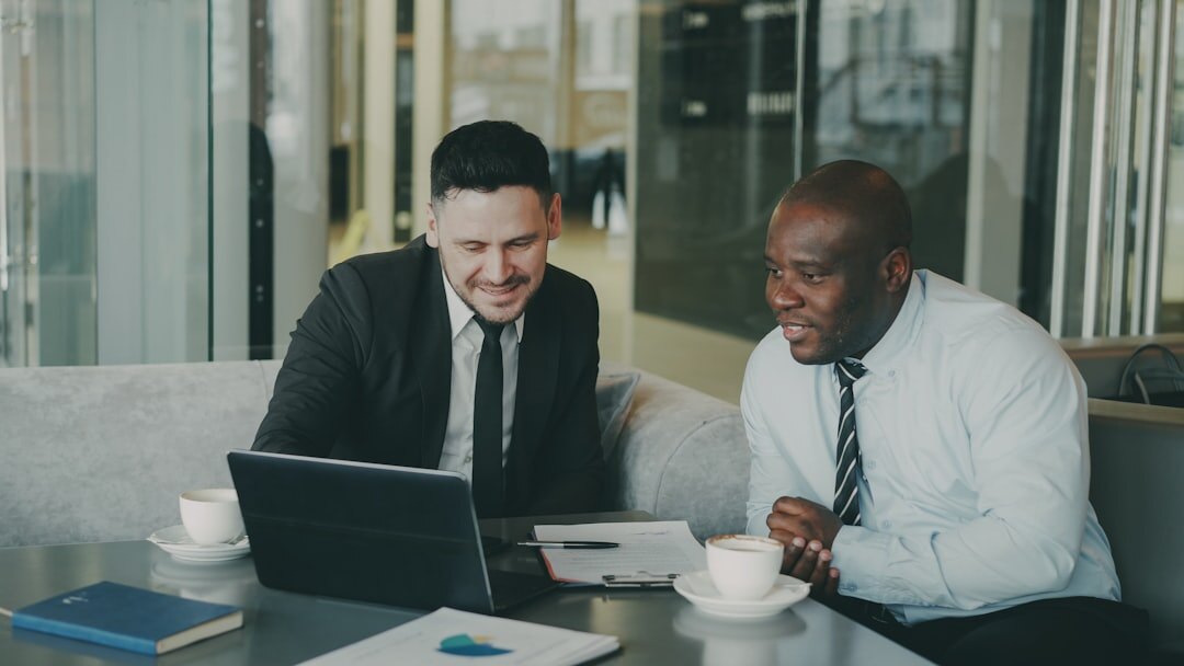 People collaborating around a table with documents