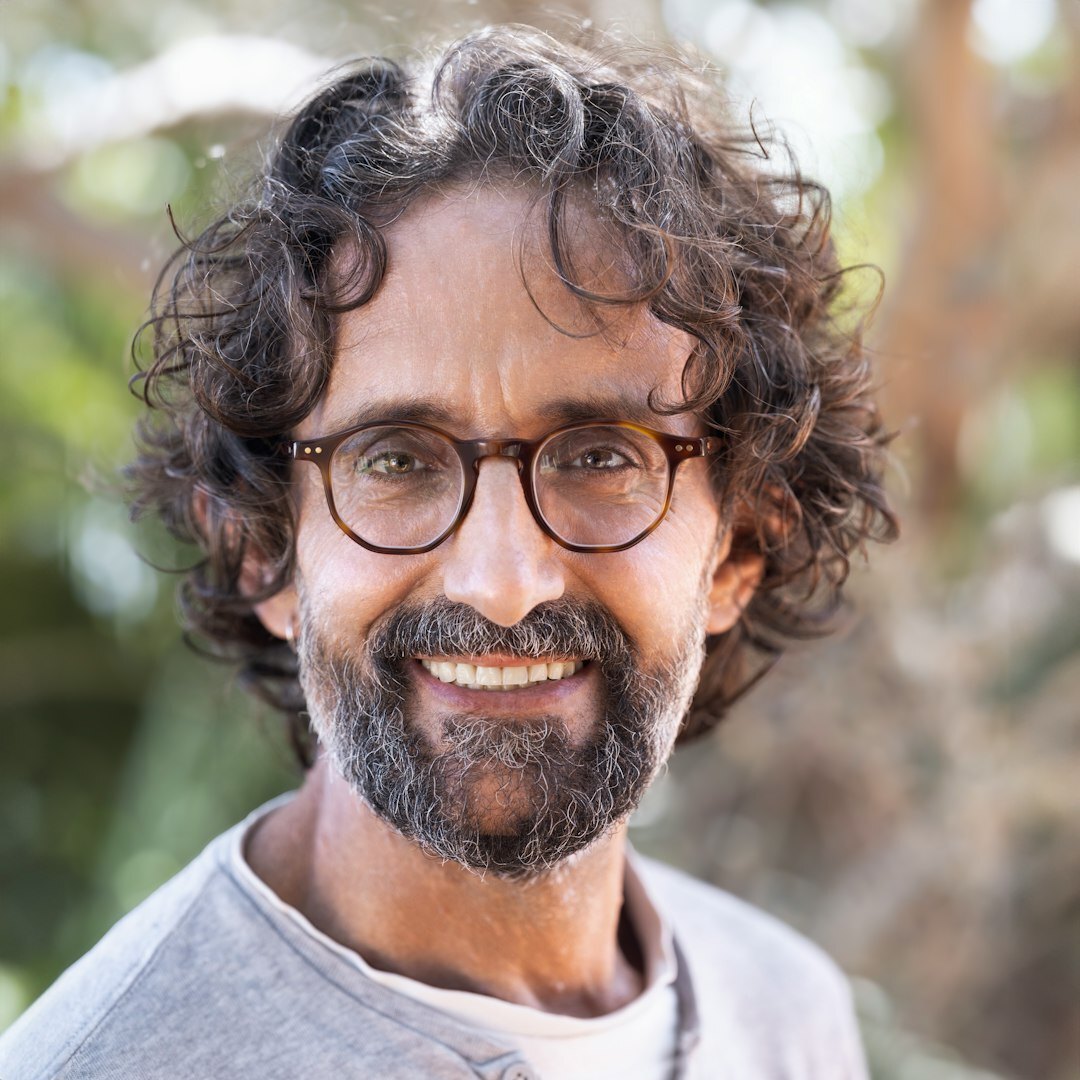 Portrait of a middle-aged man with glasses