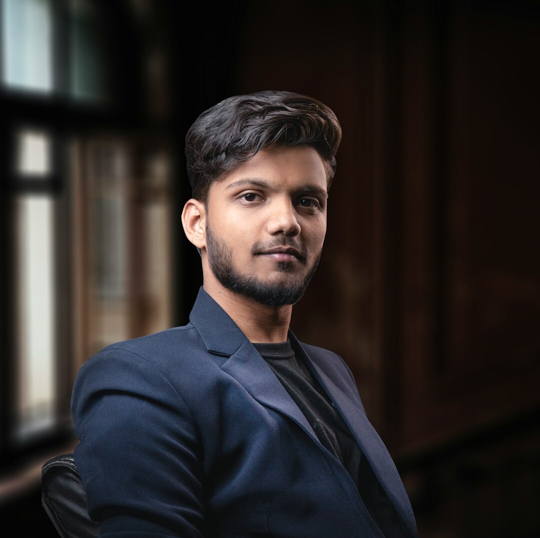 Portrait of a young professional man in a suit